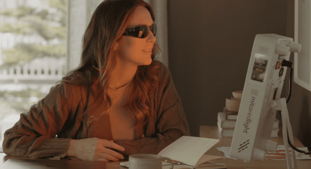 using a mito red light therapy panel on a desk